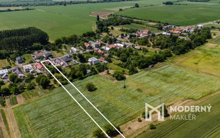Na predaj rozmerný pozemok vhodný na výstavbu v obci Moravany časť Lučkovce