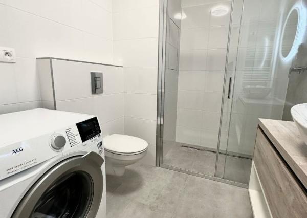 Nový 2 izbový byt Halalovka, s vlastným parkovacím miestom