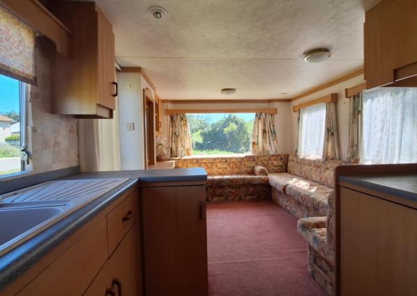 HORNÉ DRŽKOVCE – Mobilný dom s pozemkom pri potoku (790 m²)