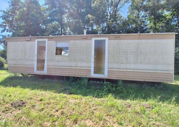 HORNÉ DRŽKOVCE – Mobilný dom s pozemkom pri potoku (790 m²)